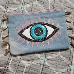 Evil eye clutch